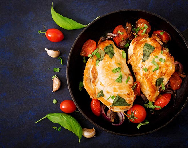 Grilled chicken with tomatoes and herbs