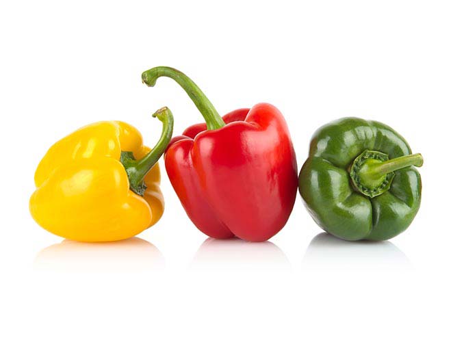 Three bell peppers on white background