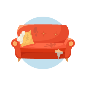 Damaged couch with stains and torn fabric
