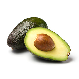 avocado Whole and halved avocado with pit