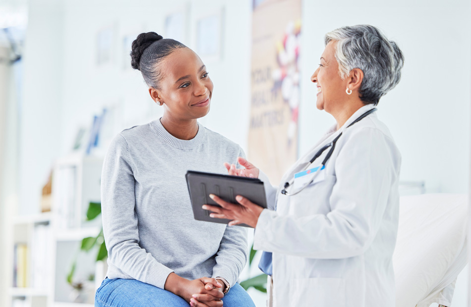 Doctor discussing medical information with patient