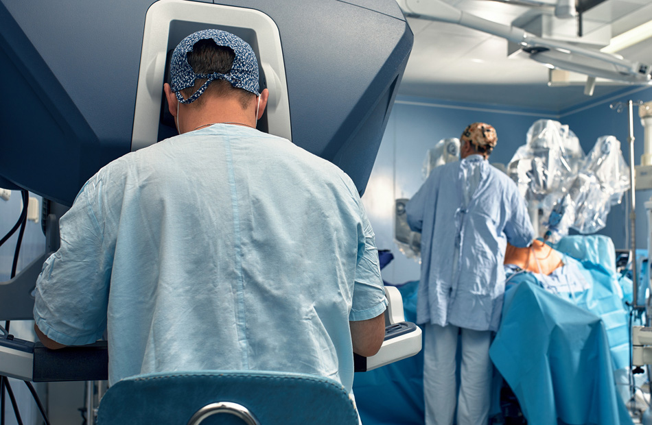 Surgical team using robotic-assisted surgery system
