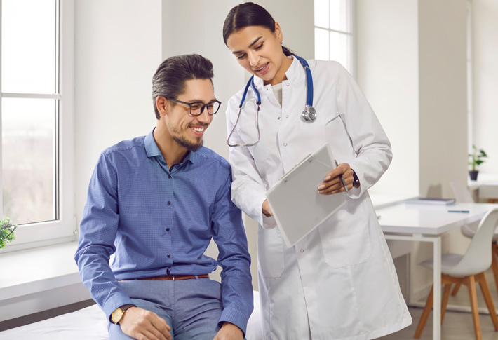 Doctor discussing medical report with patient