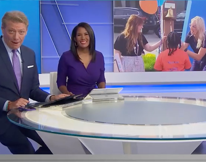 News anchors discussing community event