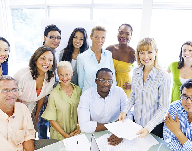 Diverse team meeting with documents