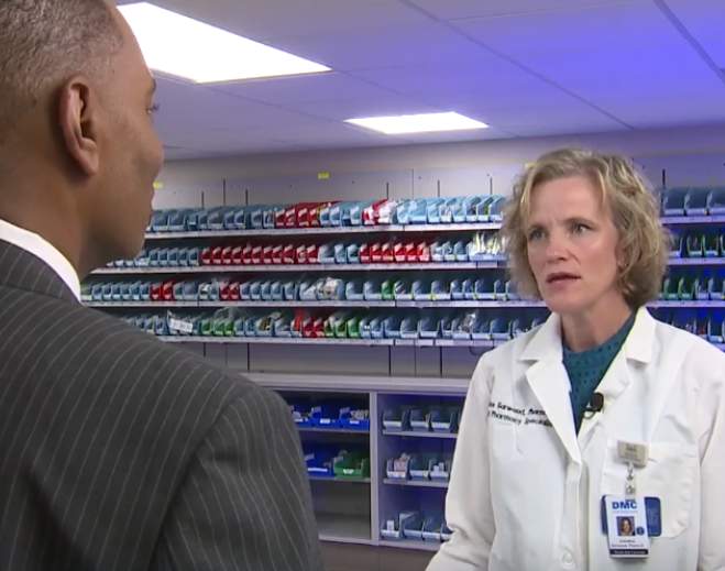 Pharmacist interviewed inside hospital pharmacy