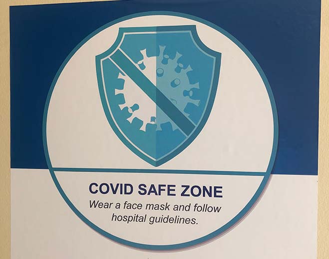 COVID safe zone hospital sign