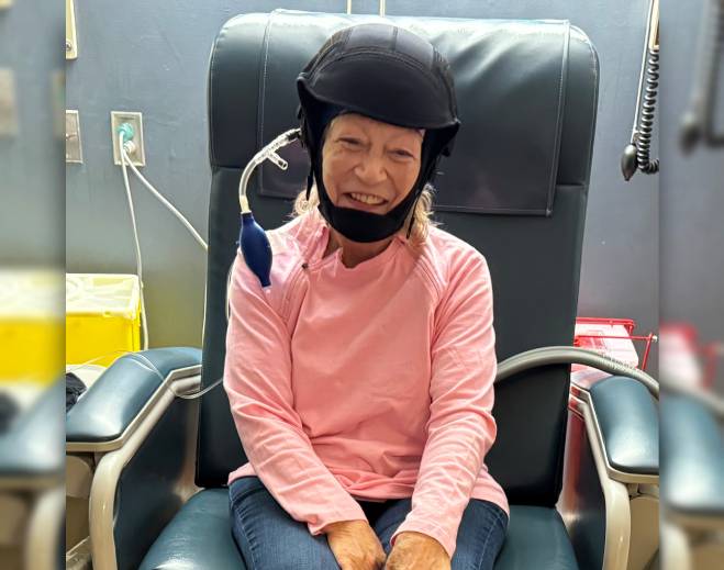 Patient wearing medical cooling helmet