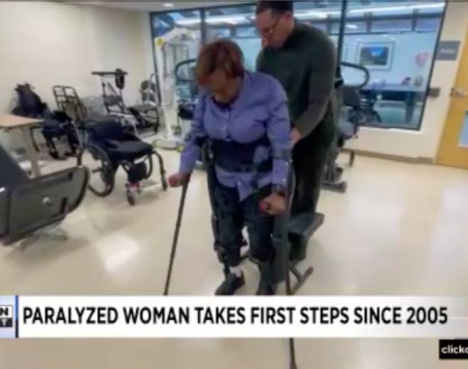 Rehabilitation patient walking with assistance