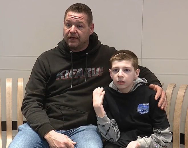 Parent and child seated together