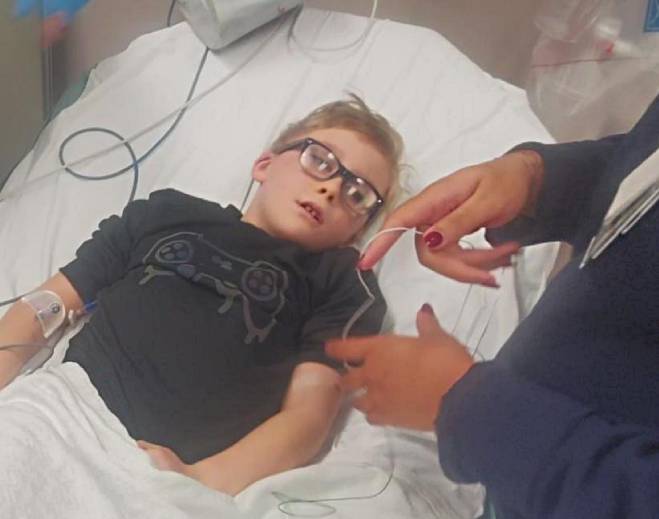 Child receiving hospital medical care