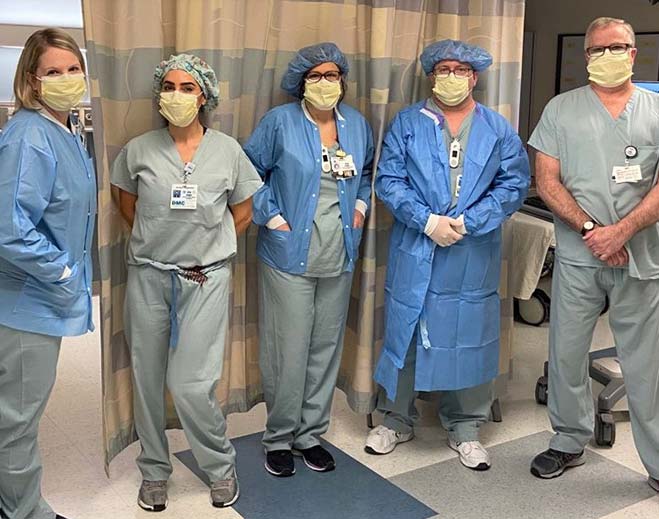 Hospital staff in surgical scrubs portrait