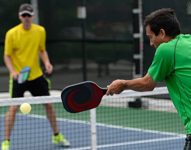 Person playing pickleball during match
