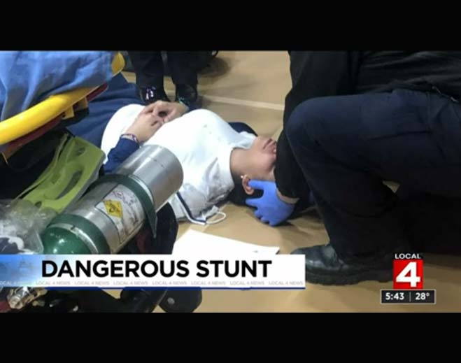 Emergency responders assisting injured person