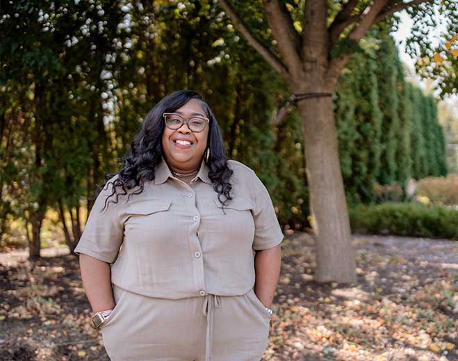 Sherkettia standing in park with trees