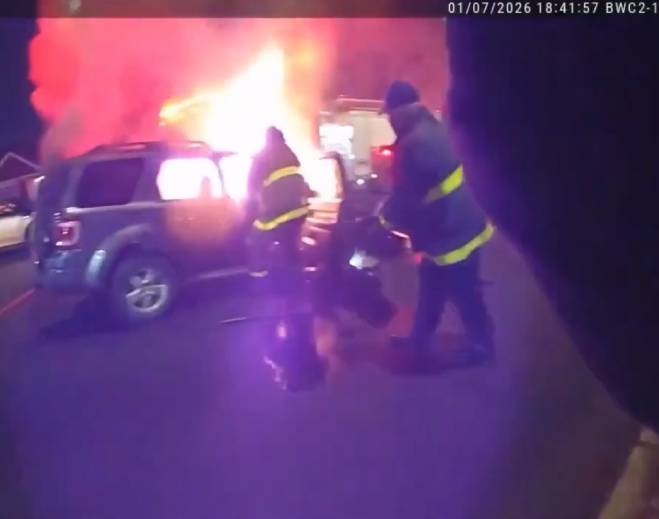Firefighters responding to vehicle fire