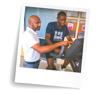 Patient using exercise rehabilitation equipment