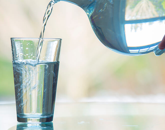 Pouring a glass of water