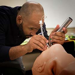 medical student doing test procedure