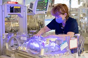 nurse caring for baby