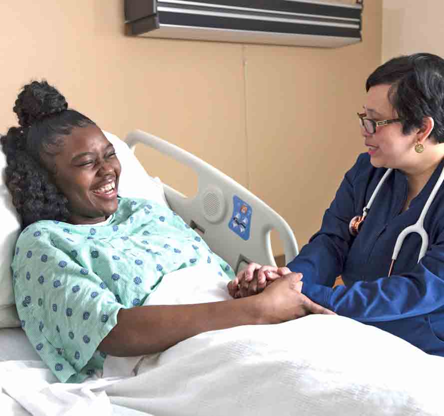 nurse comforting patient