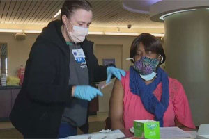 dmc-partners-with-detroit-area-churches-for-covid-19-vaccinations Beverly Cravin receiving her first COVID-19 vaccine